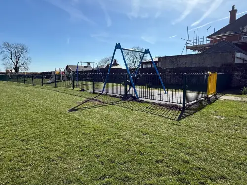 Click Here To Enlarge This Photo Of Playground Fencing & Swing